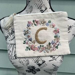 Linen blend embroidered C floral design zip clutch